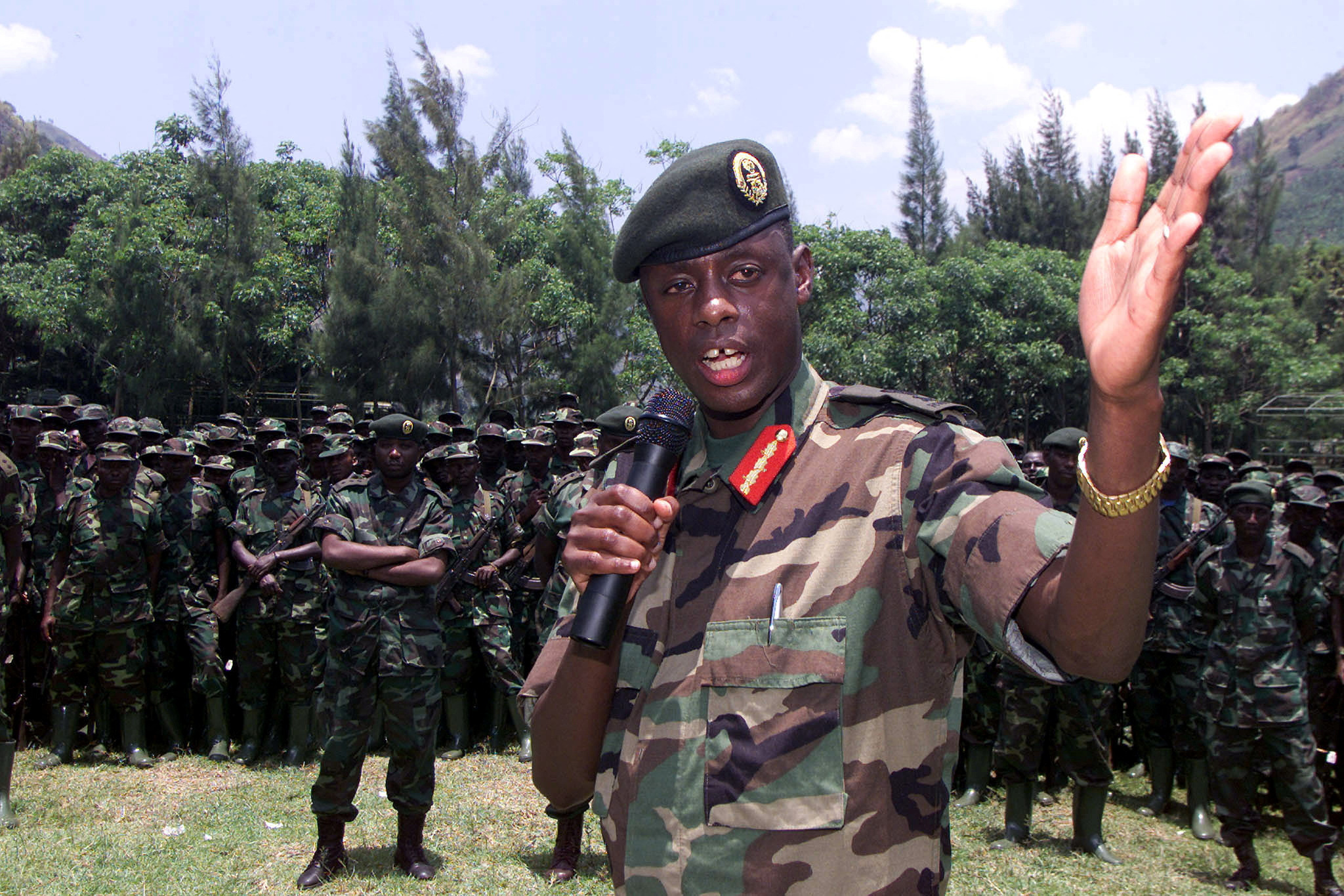 FILE PHOTO: Rwandan army chief James Kabarebe addresses soldiers pulling out of eastern Congo September 27, 2002..