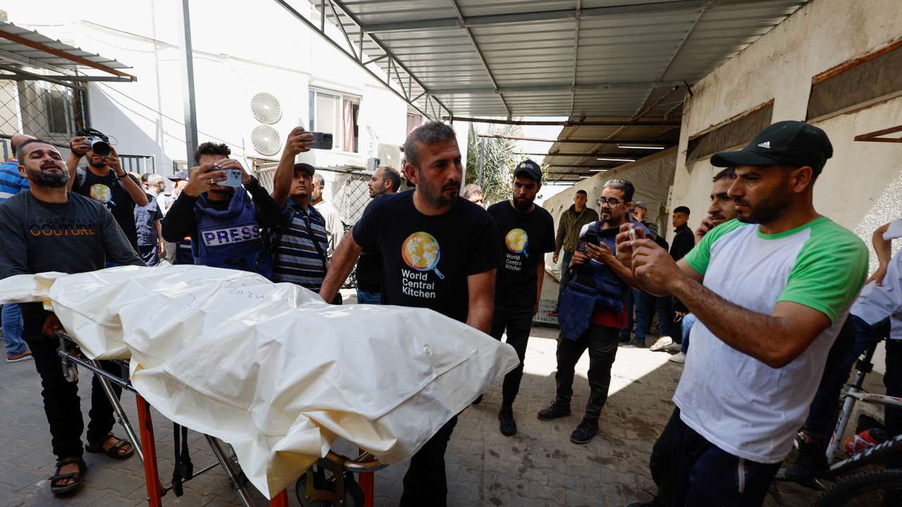 Bodies of foreign WCK workers killed in an Israeli strike are transported to their families outside Gaza, in Rafah, southern Gaza Strip