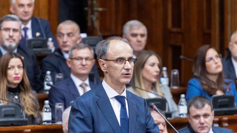 Serbia's Prime Minister-designate Djuro Macut presents a plan for the new government to parliament members in Belgrade