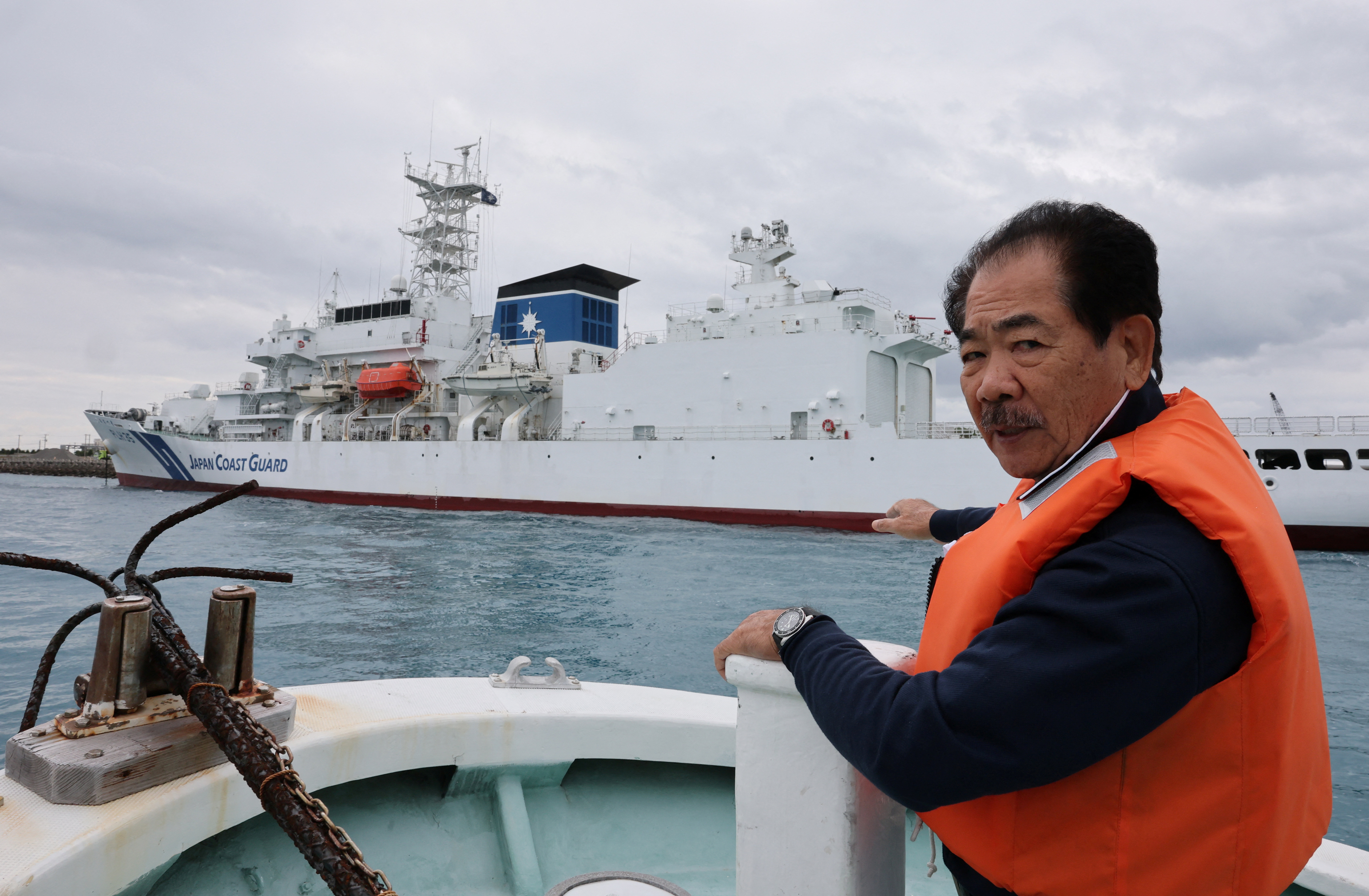 Hitoshi Nakama, a fisherman and local councilor in Ishigaki who has been fishing around a group of disputed islands called Senkaku Islands in Japan, also known in China as Diaoyu Islands, speaks during an interview with Reuters in Ishigaki