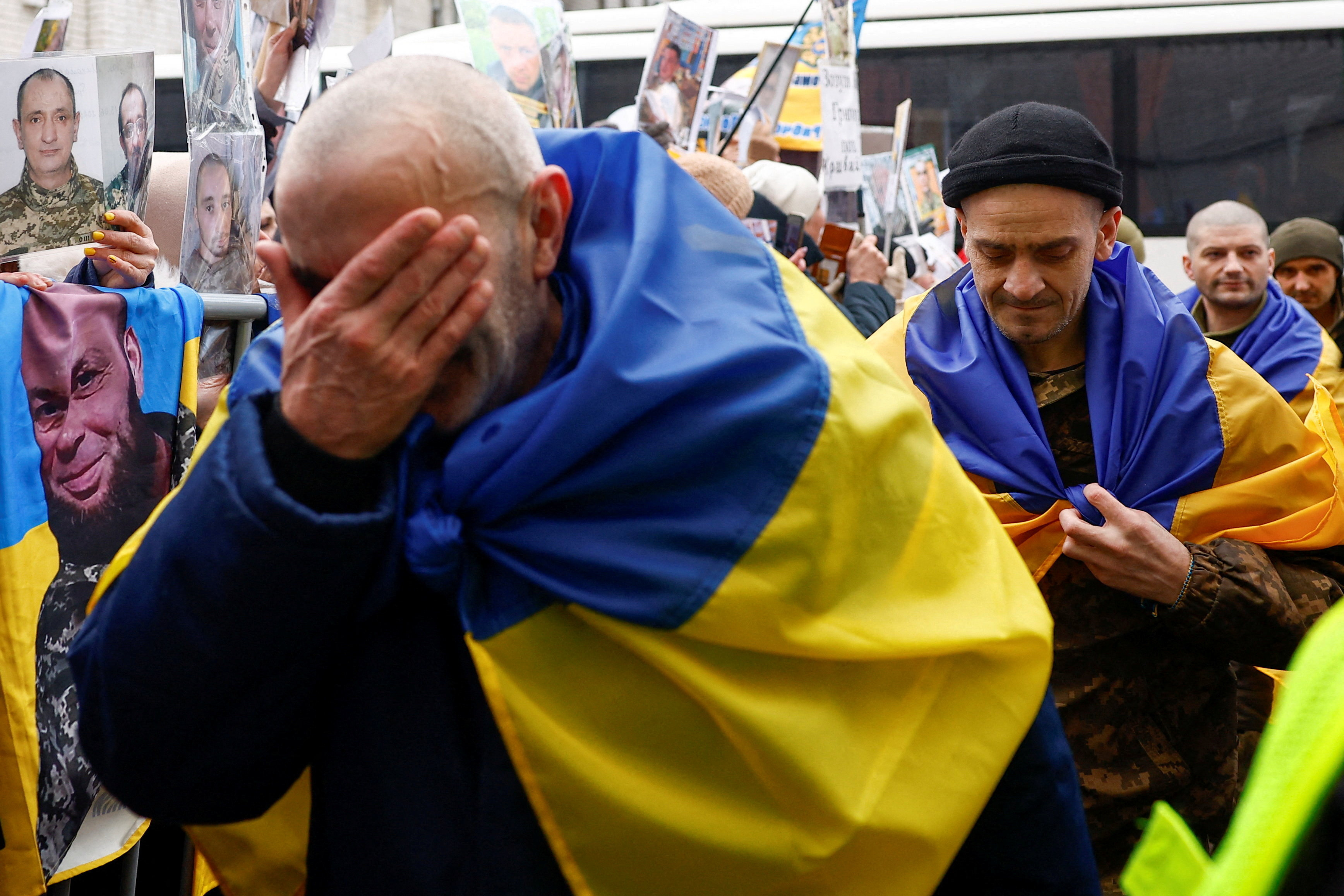Freed Ukrainian POW return after a swap in an undisclosed location in Ukraine