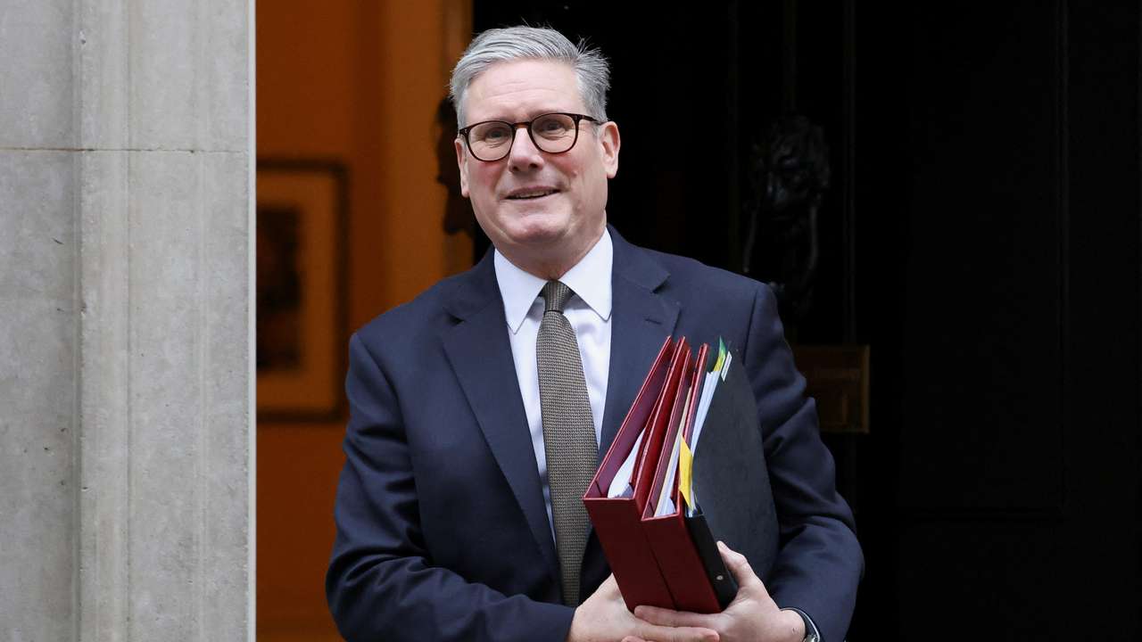 British Prime Minister Starmer walks outside 10 Downing Street