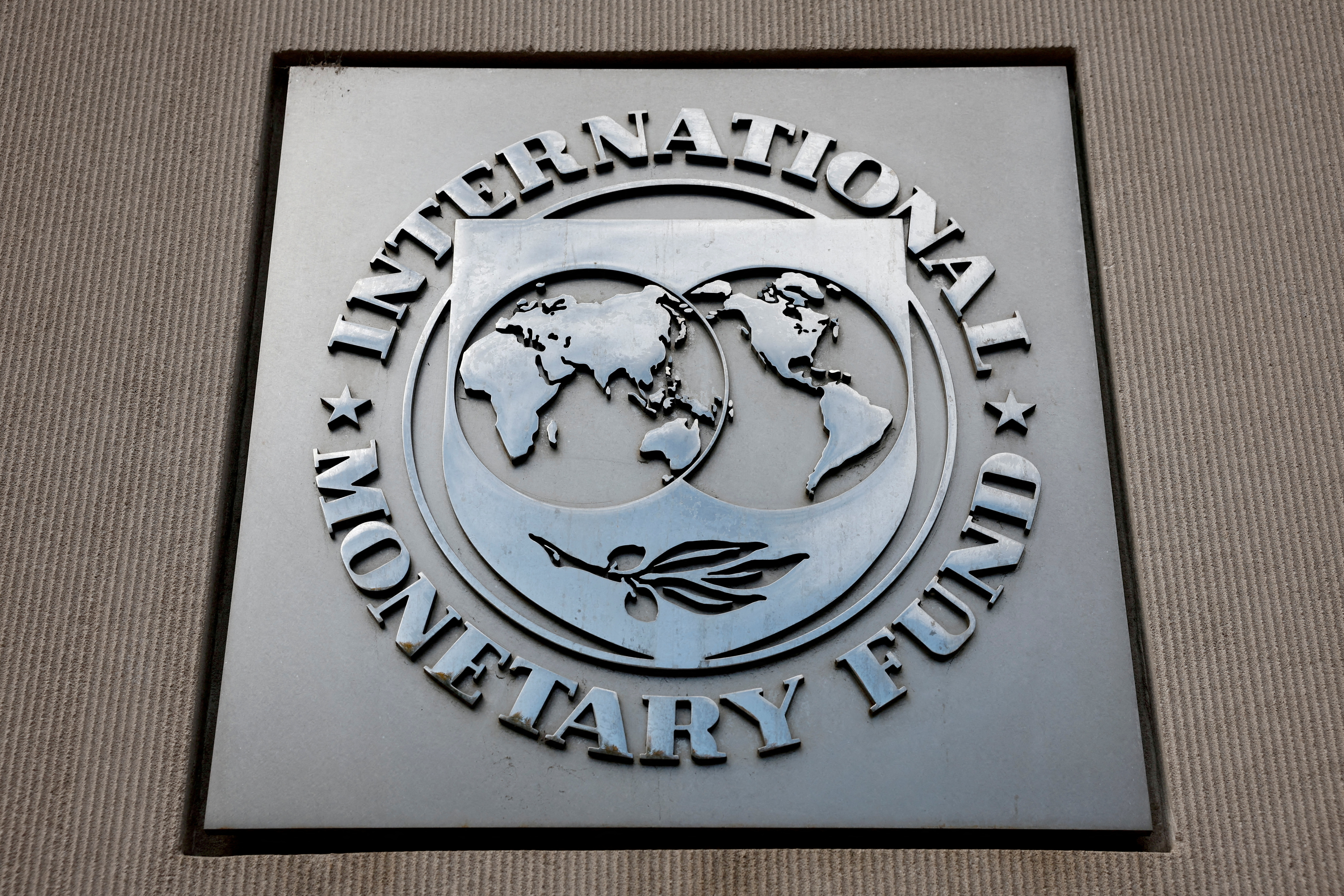 FILE PHOTO: A view of the International Monetary Fund (IMF) logo at its headquarters in Washington, D.C.