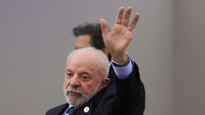 Brazil's President Luiz Inacio Lula da Silva leaves after a press conference on the second day of the G20 Leaders' Summit in Johannesburg
