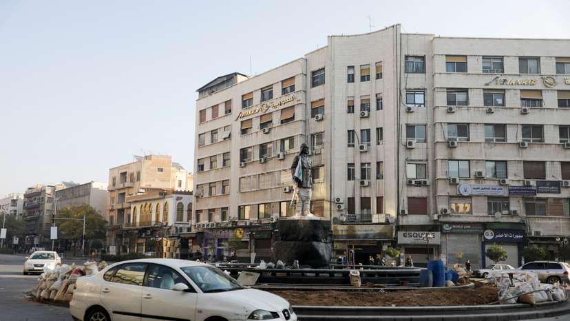 A car drives on the street, in Damascus