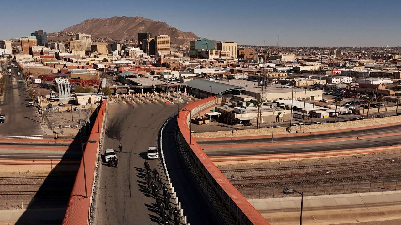 Members of U.S. Customs and Border Protection (CBP) perform a drill at the Paso del Norte International border bridge, as seen from Ciudad Juarez