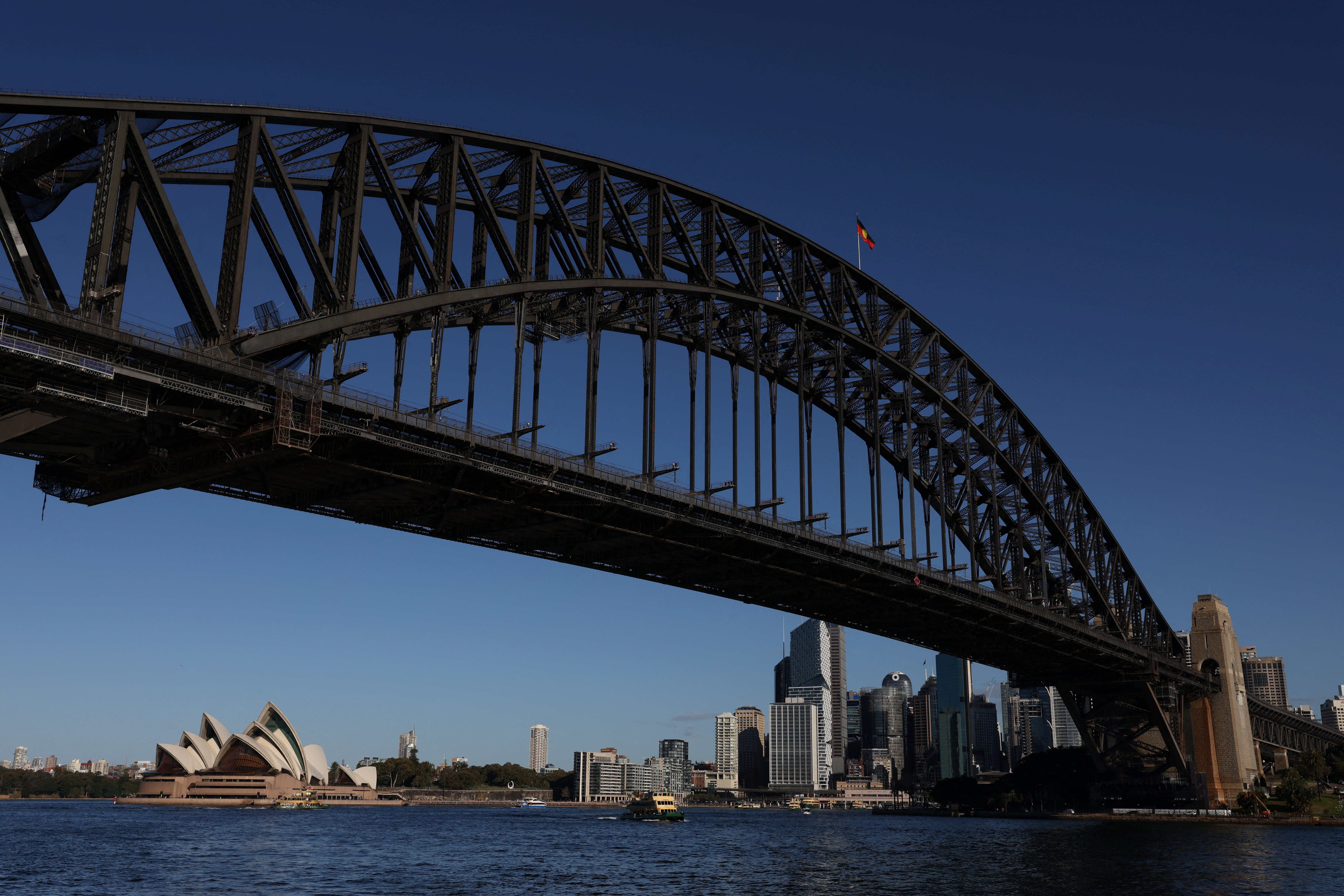 A view of the Sydney Harbour Bridge and the Sydney Opera House in Sydney