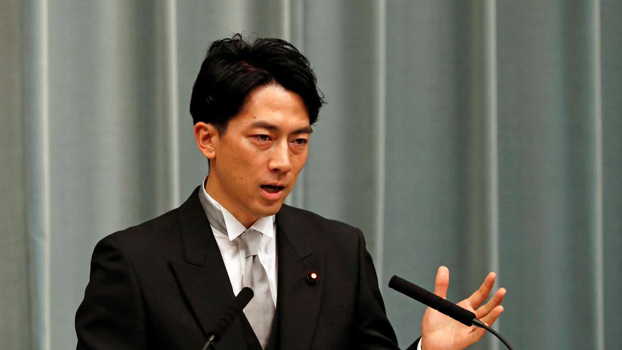 FILE PHOTO: Japan's Environment Minister Shinjiro Koizumi speaks at a news conference in Tokyo
