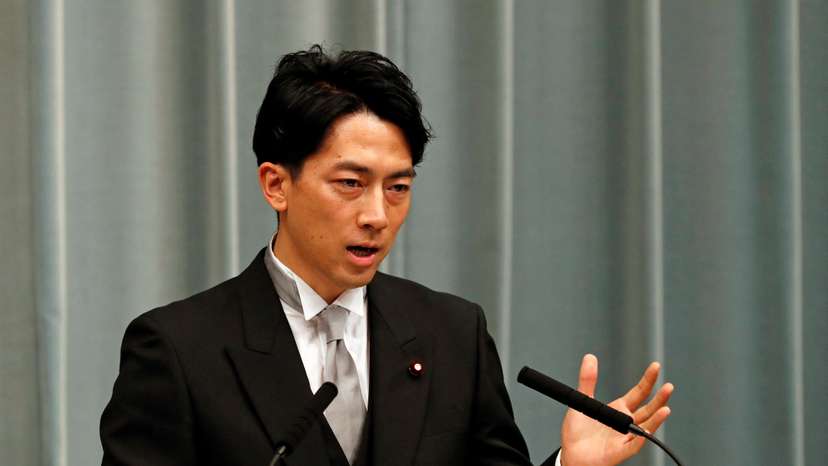 FILE PHOTO: Japan's Environment Minister Shinjiro Koizumi speaks at a news conference in Tokyo