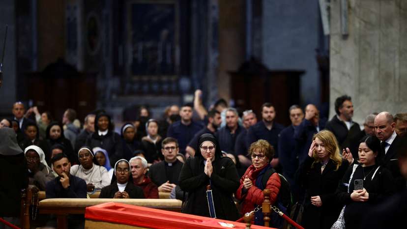 Faithful pay respect as Pope Francis lies in state in St. Peter's Basilica, at the Vatican