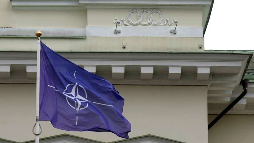 NATO flag flutters next to Presidential Palace in Vilnius