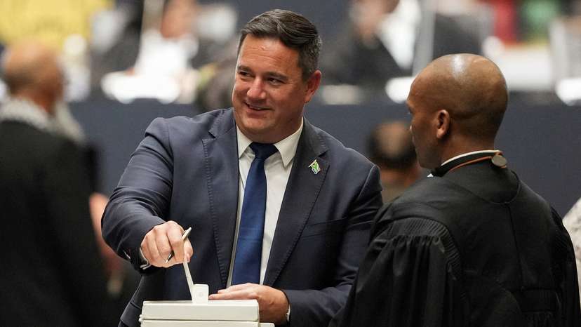 FILE PHOTO: Leader of the Democratic Alliance (DA) John Steenhuisen casts his ballot in vote for the speaker of parliament.