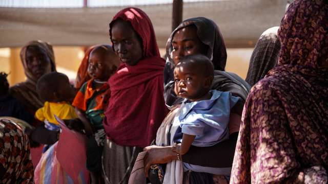 Handout photograph of a woman and baby at the Zamzam displacement camp in North Darfur