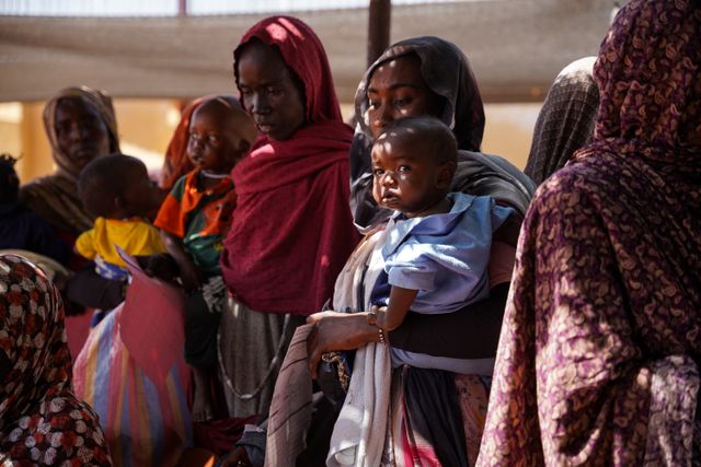 Handout photograph of a woman and baby at the Zamzam displacement camp in North Darfur