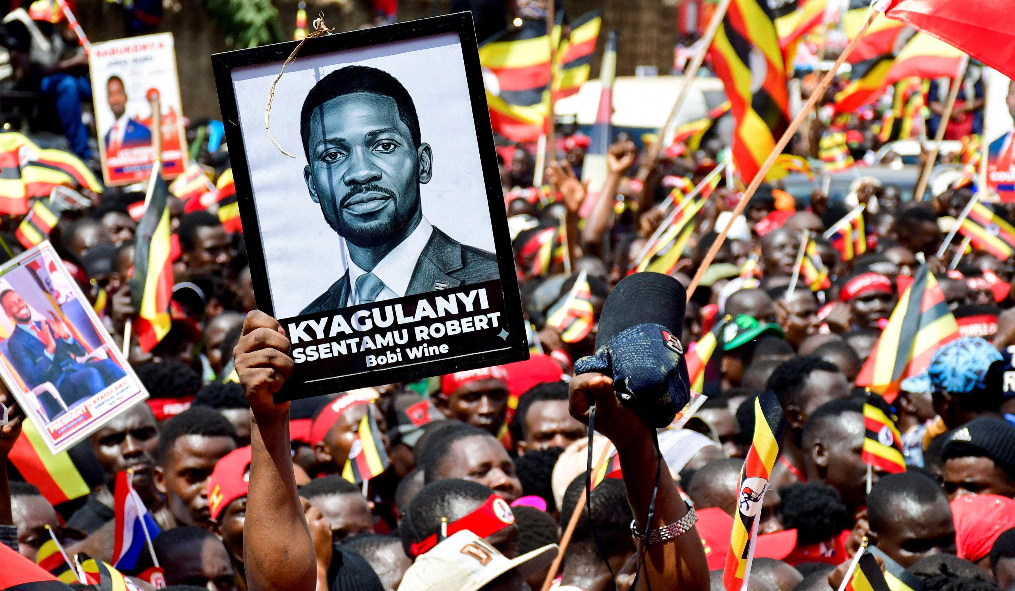 FILE PHOTO: Ugandan Presidential candidate Robert Kyagulanyi of the National Unity Platform (NUP) party attends a campaign rally, in Kampala