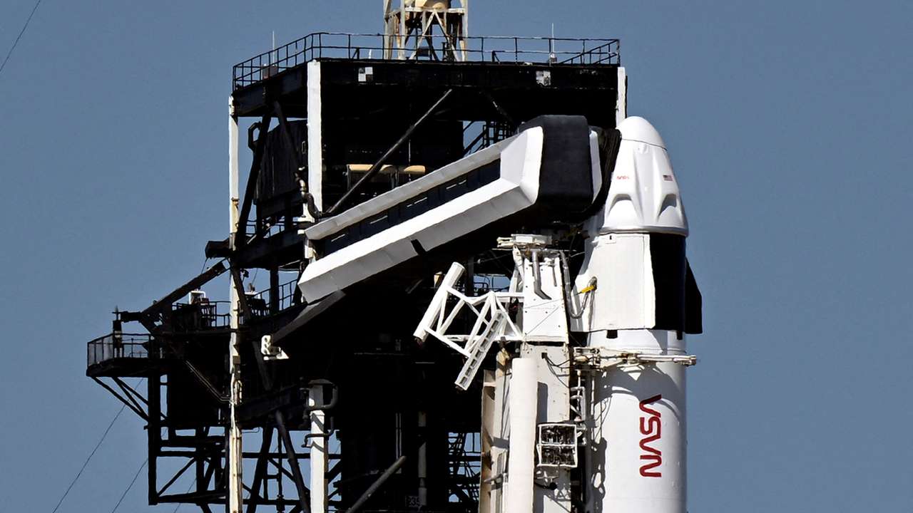 A SpaceX Falcon 9 rocket stands on Launch Complex 39A where it is scheduled to carry a crew of four to the International Space Station