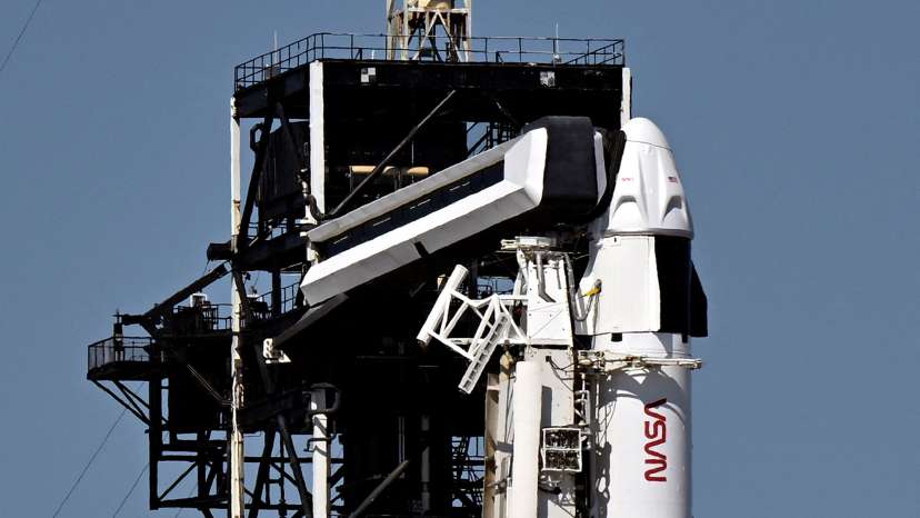A SpaceX Falcon 9 rocket stands on Launch Complex 39A where it is scheduled to carry a crew of four to the International Space Station