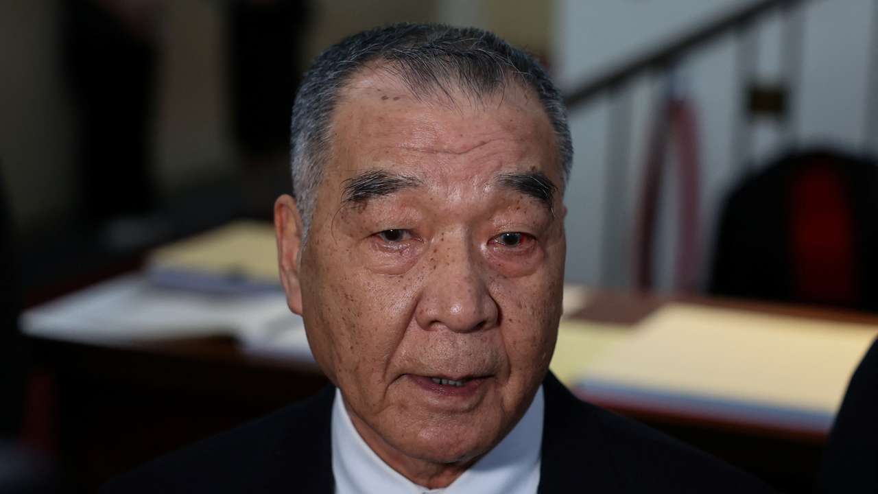 Taiwan's Defence Minister Chiu Kuo-cheng speaks to the media before attending a parliament session in Taipei