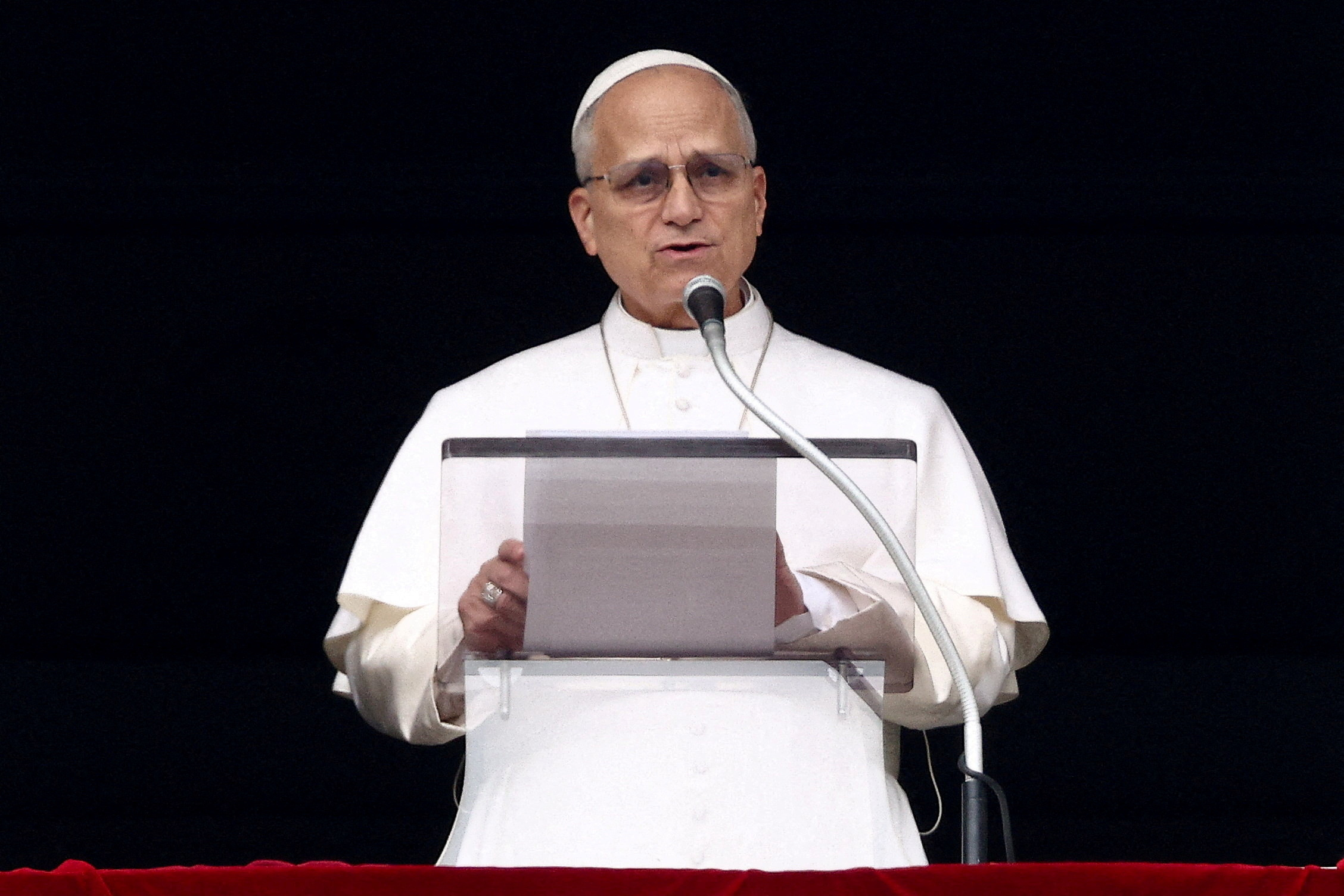 FILE PHOTO: Pope Leo XIV leads the Angelus prayer at the Vatican