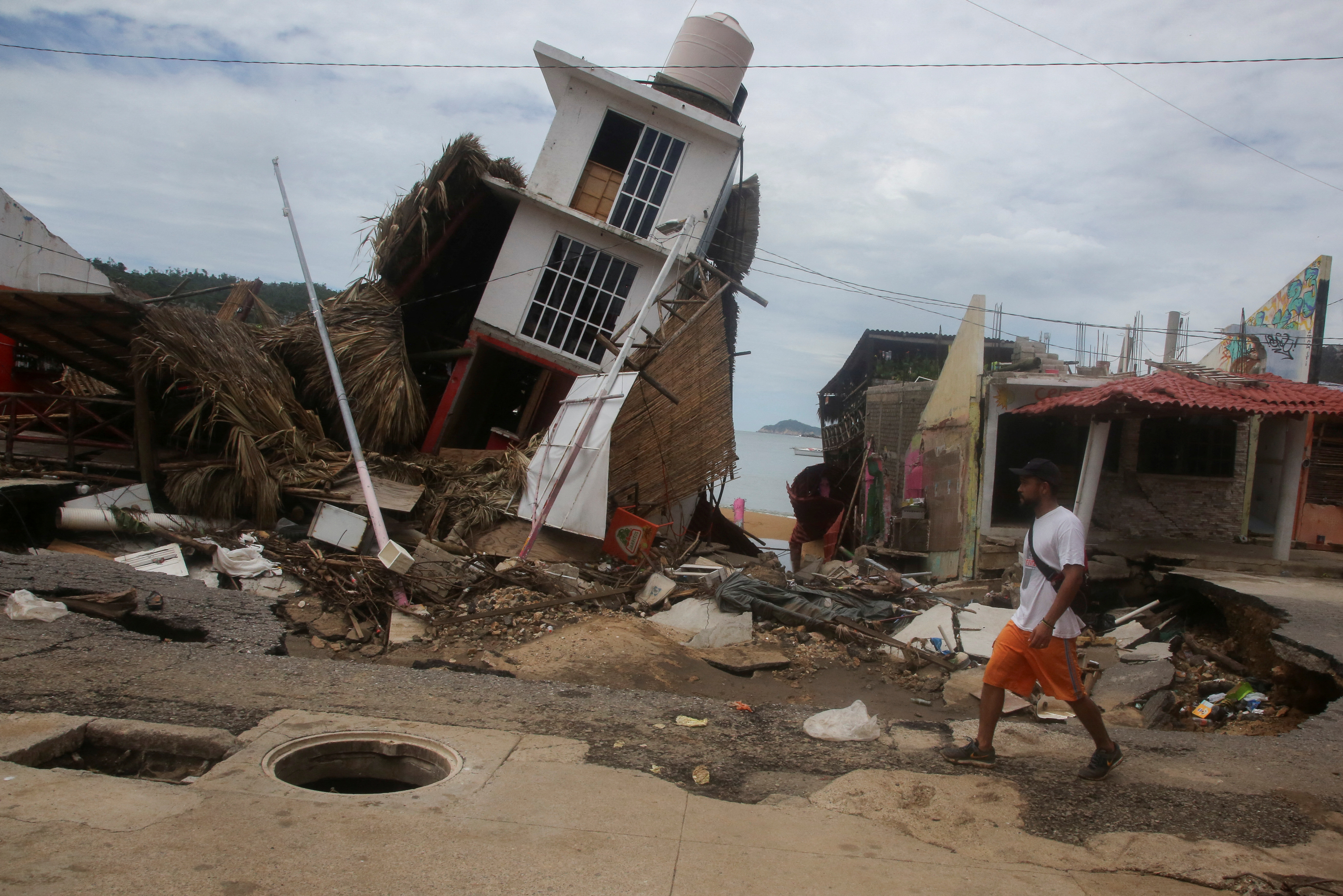 Storm John dissipates over Mexico