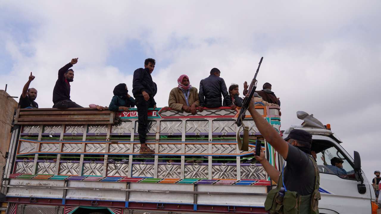 Bedouin families leave the village of Al-Mazraa