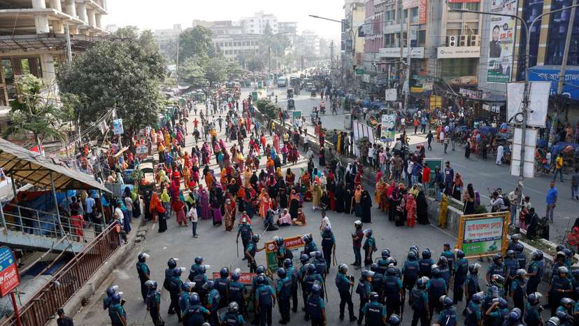 FILE PHOTO: Garment industry workers stage a protest demanding a wage raise, in Dhaka