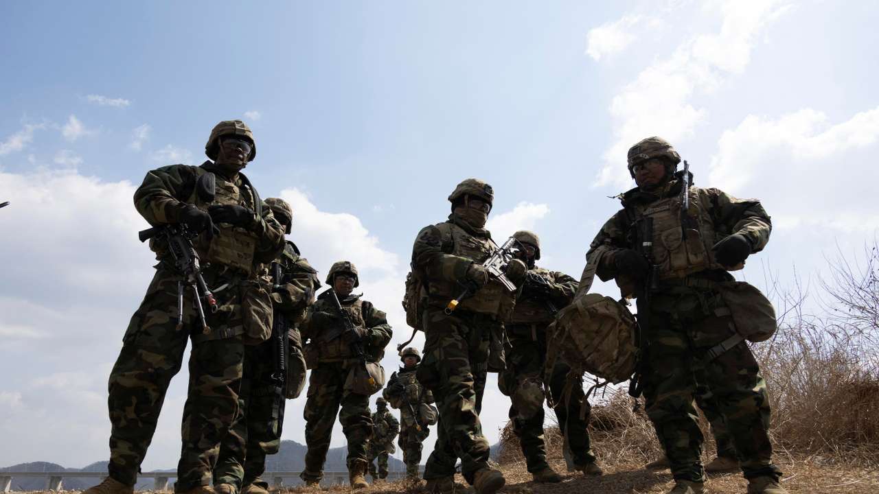 FILE PHOTO: South Korean and US soldiers conduct a joint river-crossing exercise in Yeoncheon