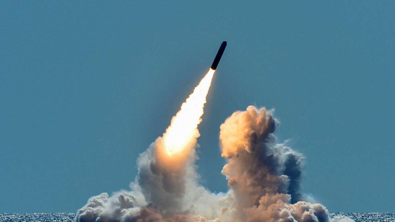 FILE PHOTO: An unarmed Trident II D5 missile is test-launched from the ballistic missile submarine USS Nebraska