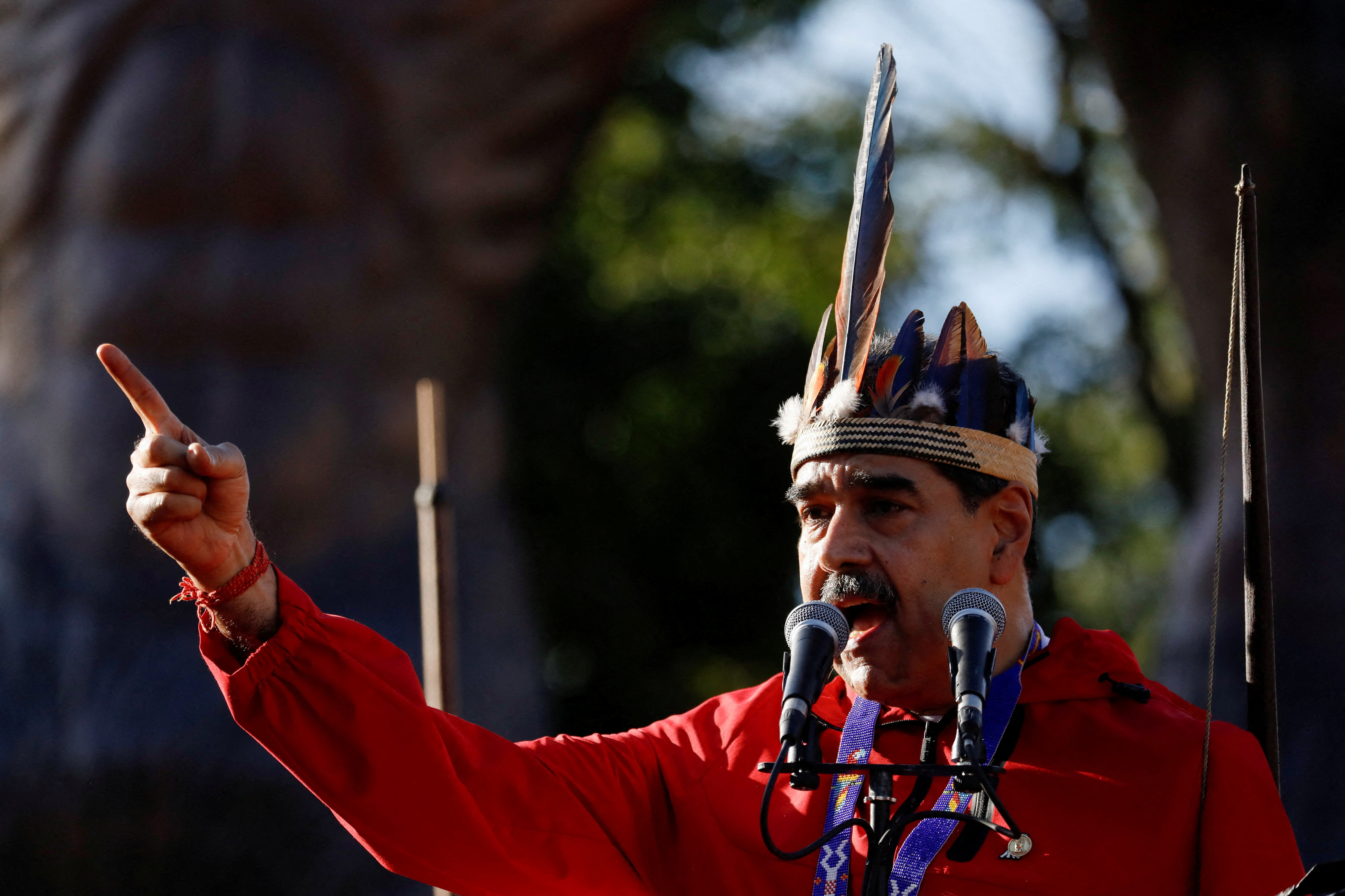 FILE PHOTO: Venezuela's President Maduro participates in a demonstration to mark Indigenous Resistance Day, in Caracas