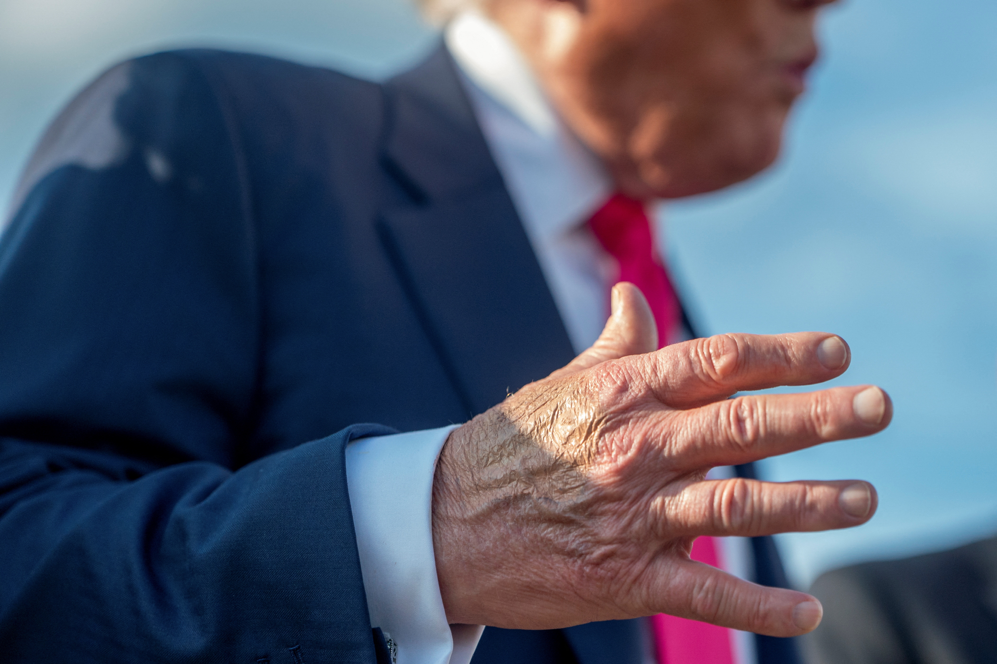 FILE PHOTO: U.S. President Donald Trump speaks to members of the media upon his arrival from Pennsylvania, at Joint Base Andrews