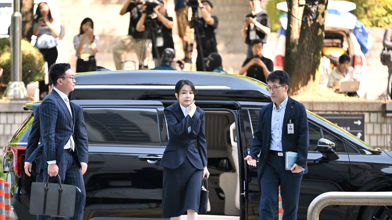 South Korea's former first lady Kim Keon Hee arrives at a court to attend a hearing to review her arrest warrant, in Seoul