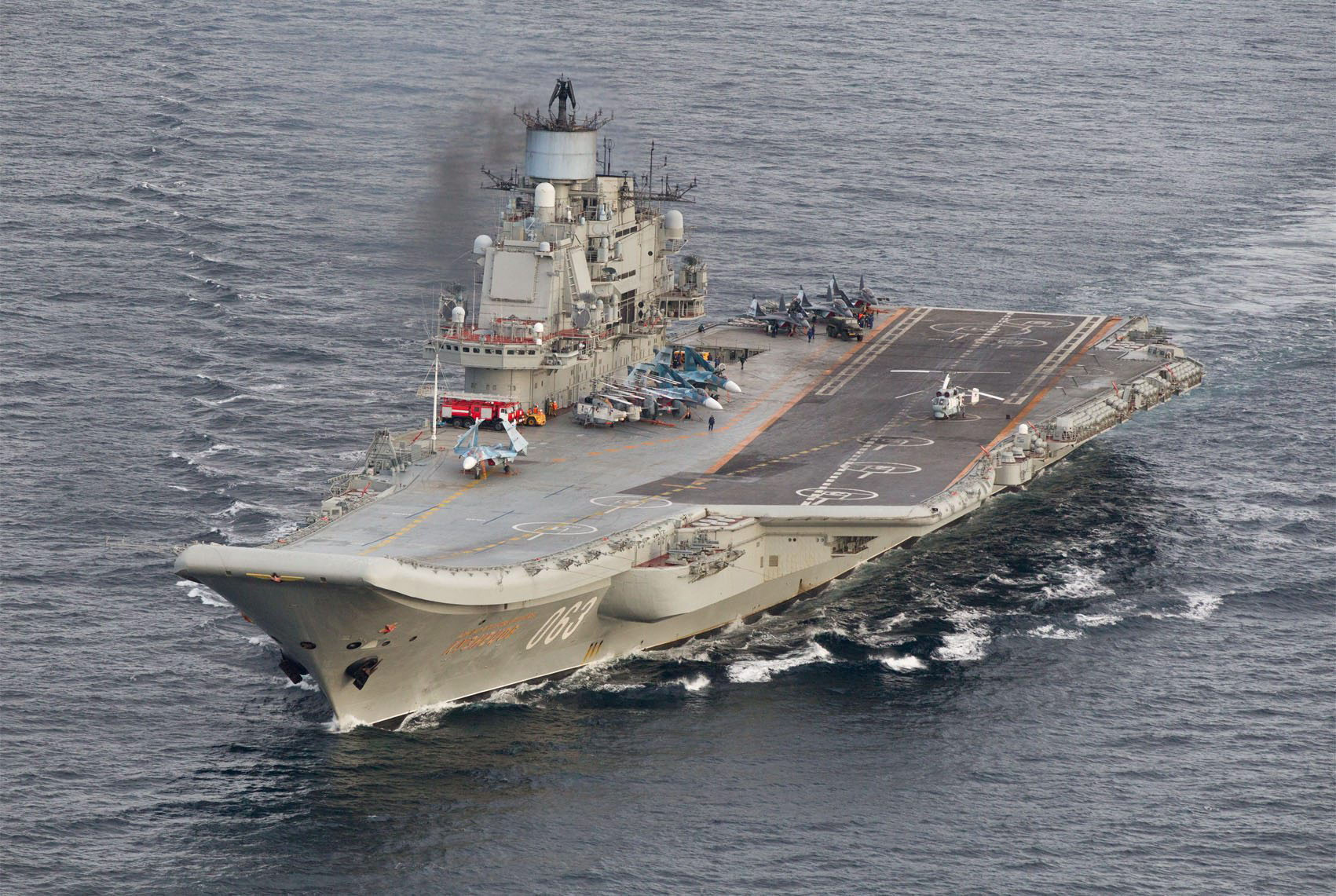 FILE PHOTO: A photo taken from a Norwegian surveillance aircraft shows Russian aircraft carrier Admiral Kuznetsov in international waters off the coast of Northern Norway