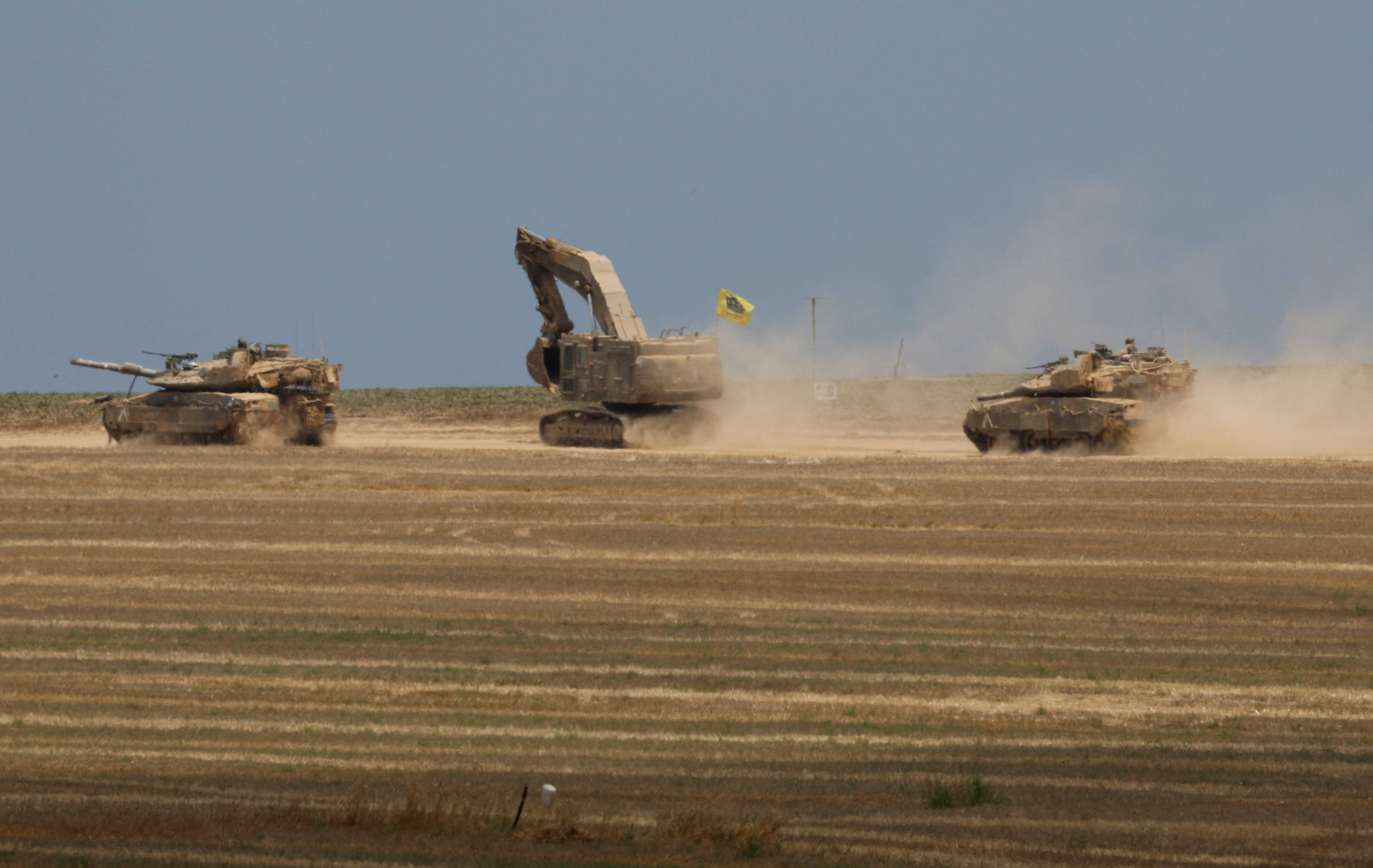 Israeli tanks manoeuvre near the Israel-Gaza Border