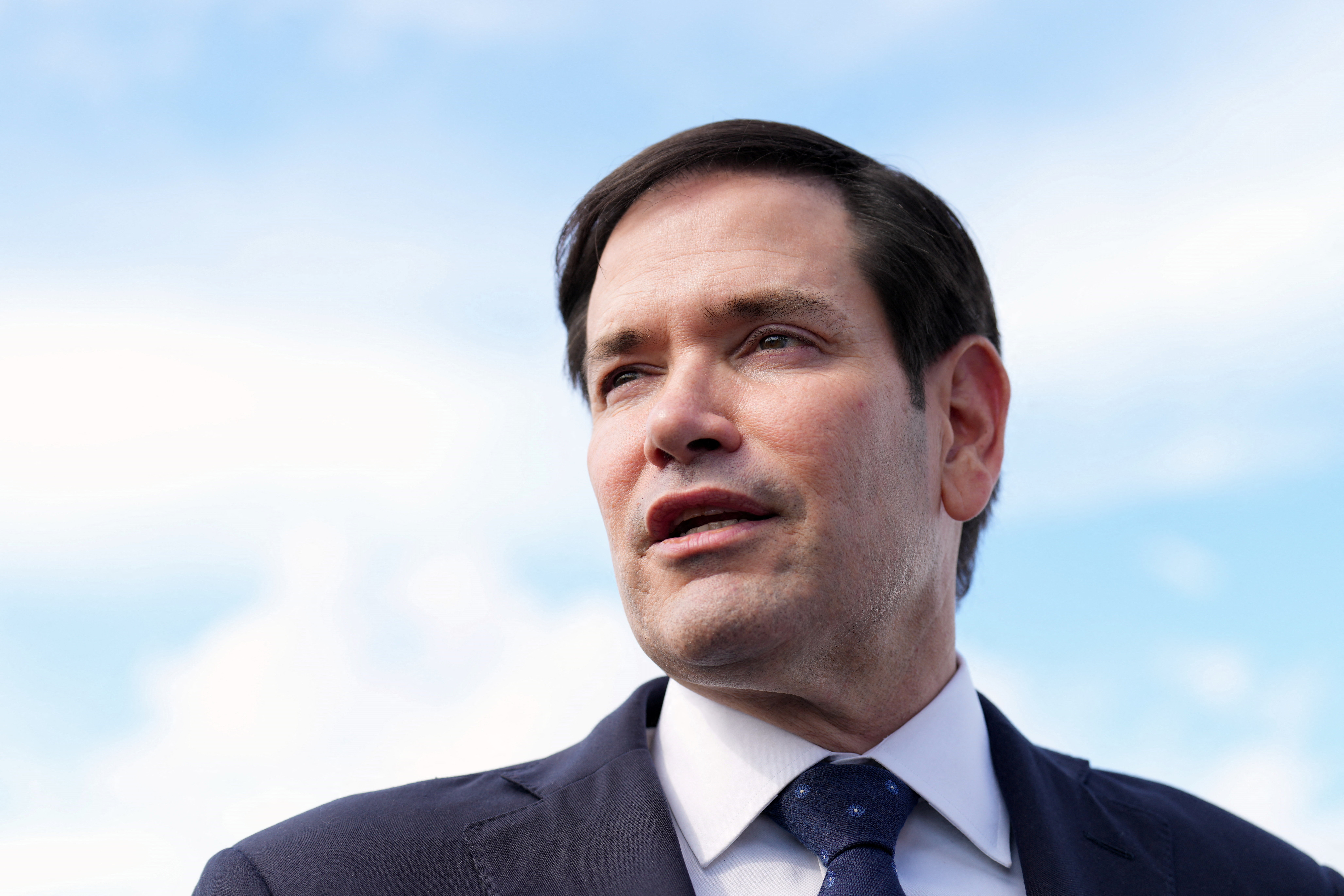 U.S. Secretary of State Marco Rubio speaks to reporters before boarding his plane at Homestead Air Reserve Base in Homestead