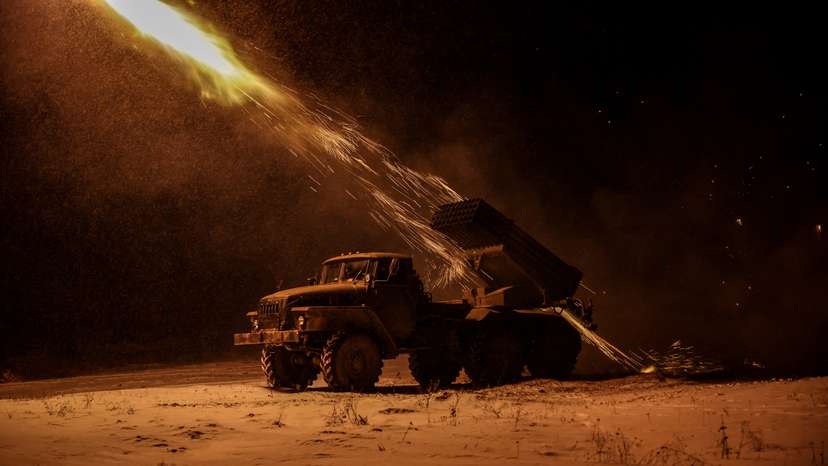 Ukrainian servicemen fire a BM-21 Grad multiple-launch rocket system toward Russian troops on a front line near the town of Chasiv Yar
