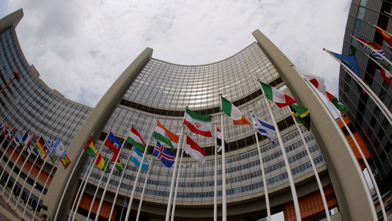 The Iranian and other flags flutter in front of the International Atomic Energy Agency (IAEA) organisation's headquarters in Vienna