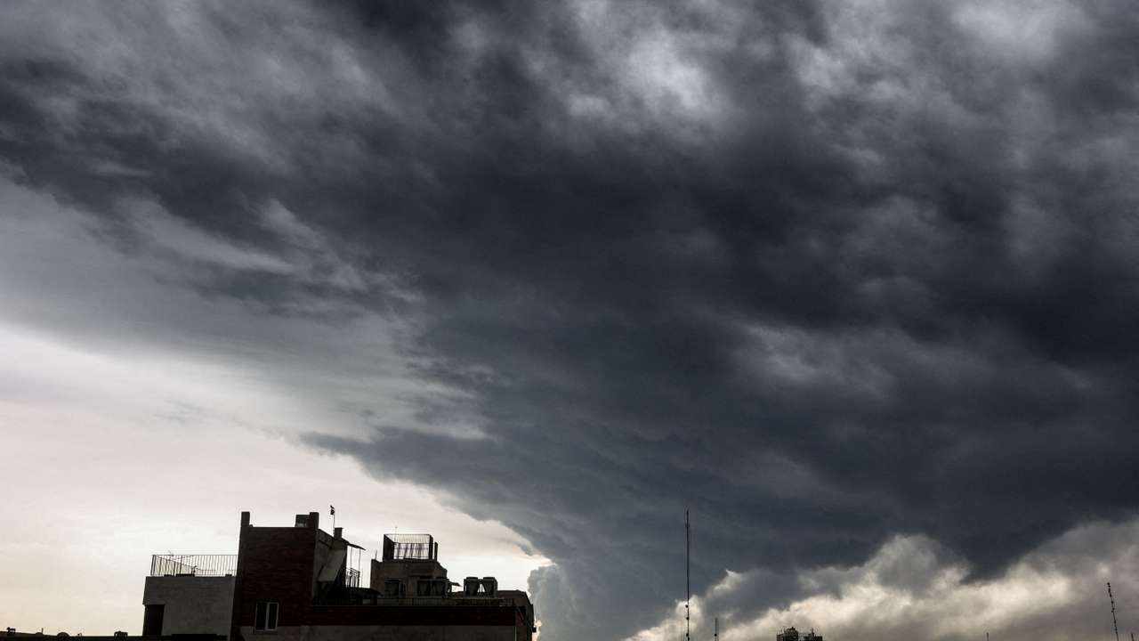 Smoke continues to rise after a reported strike on fuel tanks in an oil refinery, amid the U.S.-Israeli conflict with Iran, in Tehran