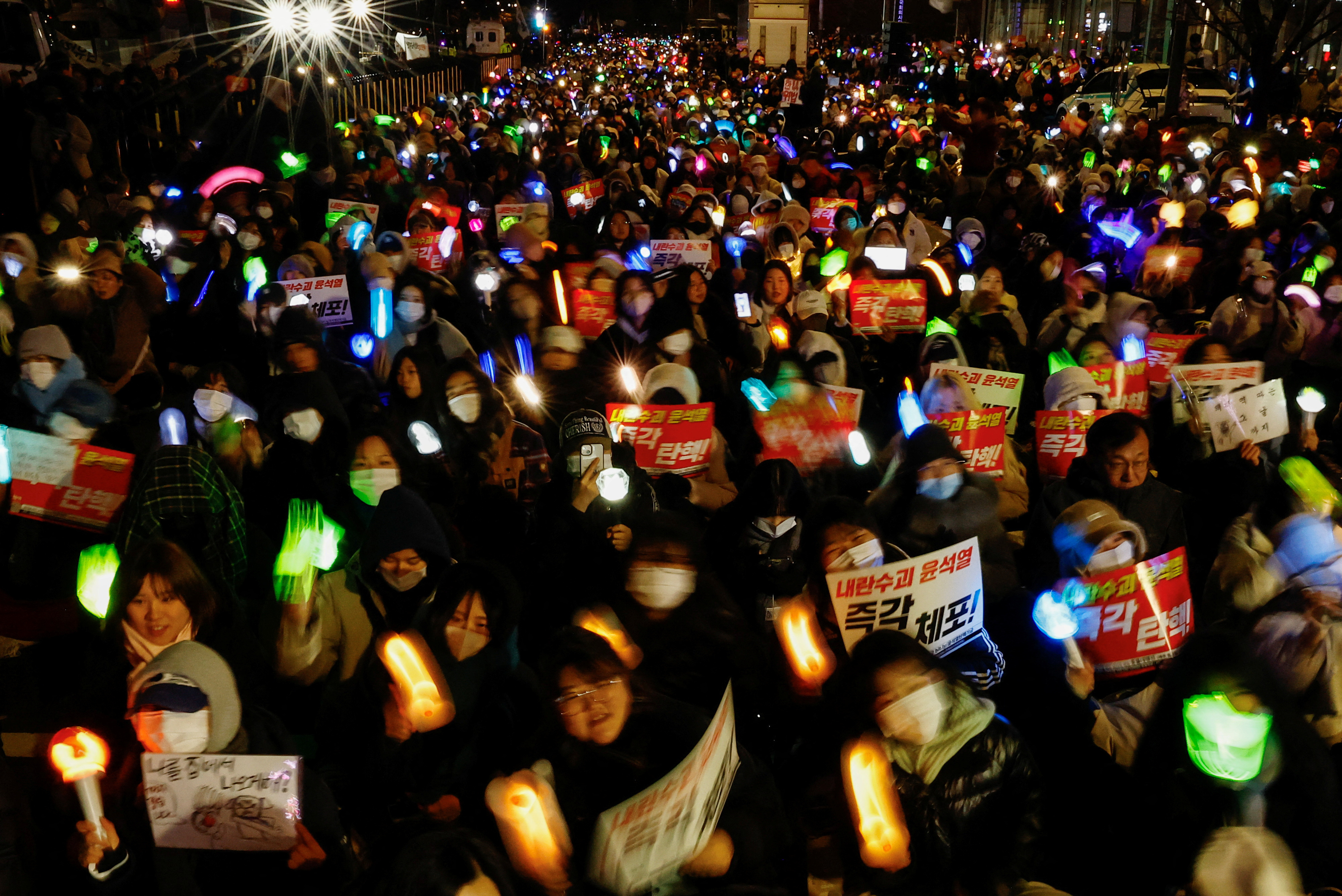 Protesters take part in a rally calling for the impeachment of South Korean President Yoon Suk Yeol, in Seoul