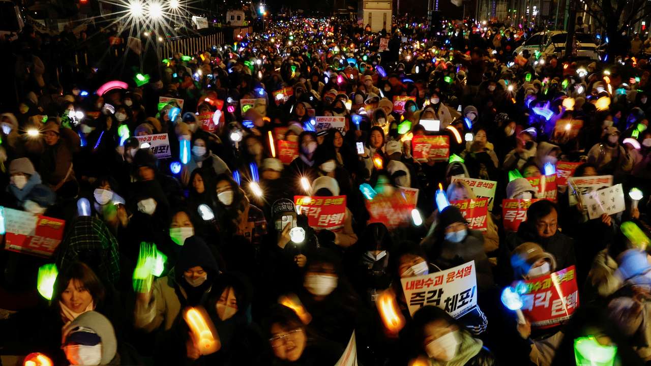 Protesters take part in a rally calling for the impeachment of South Korean President Yoon Suk Yeol, in Seoul