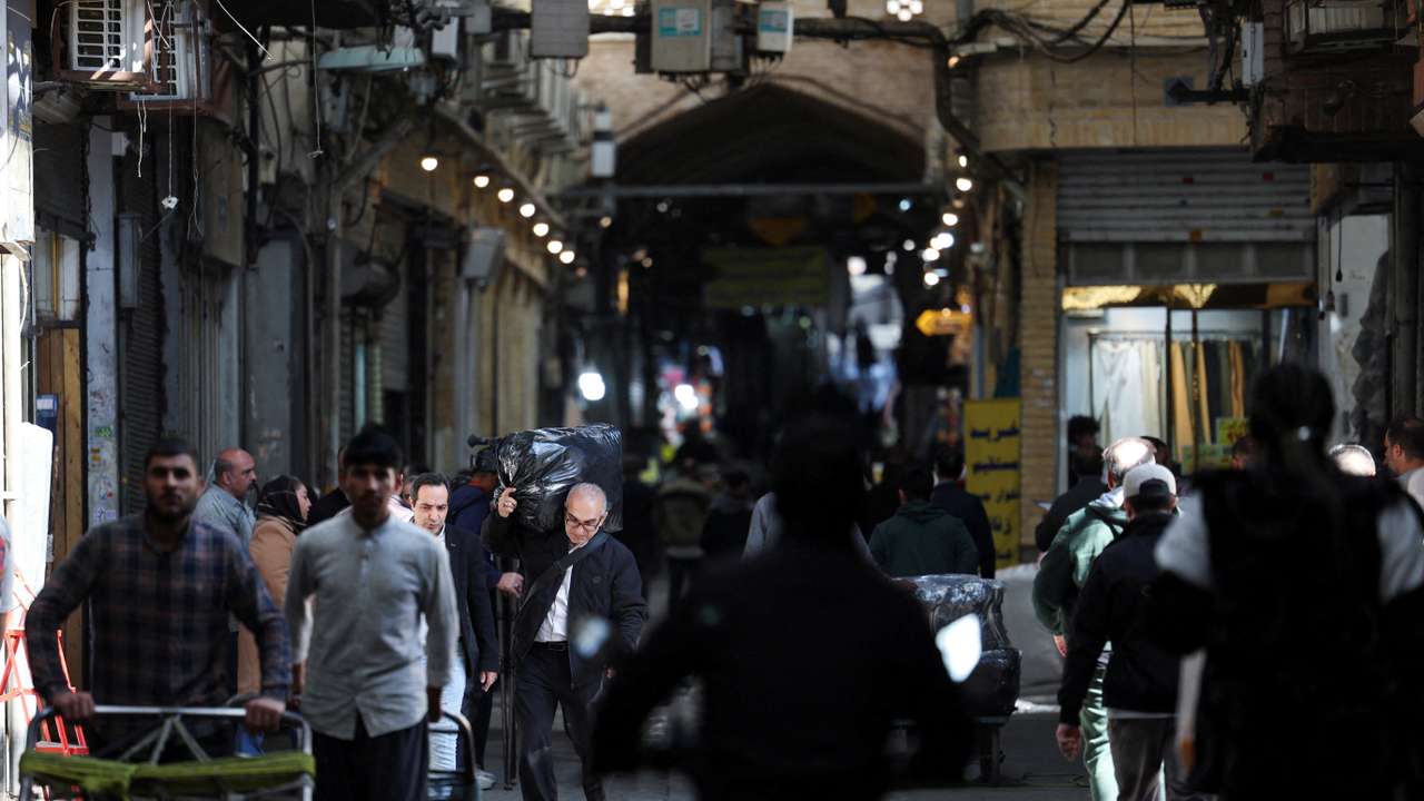 People visit the Grand Bazaar, in Tehran