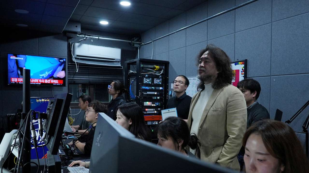 South Korean journalist Kim Ou-joon checks a live broadcast after an interview with Reuters at his recording studio in Seoul
