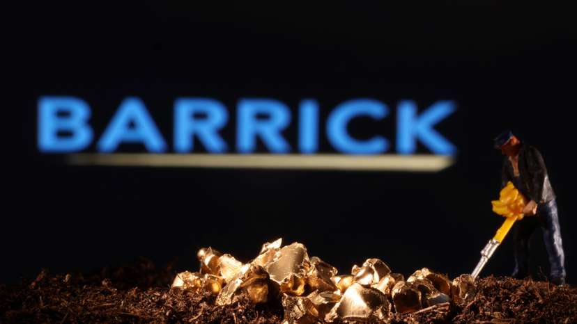 Small toy figure and gold imitation are seen in front of the Barrick logo in this illustration