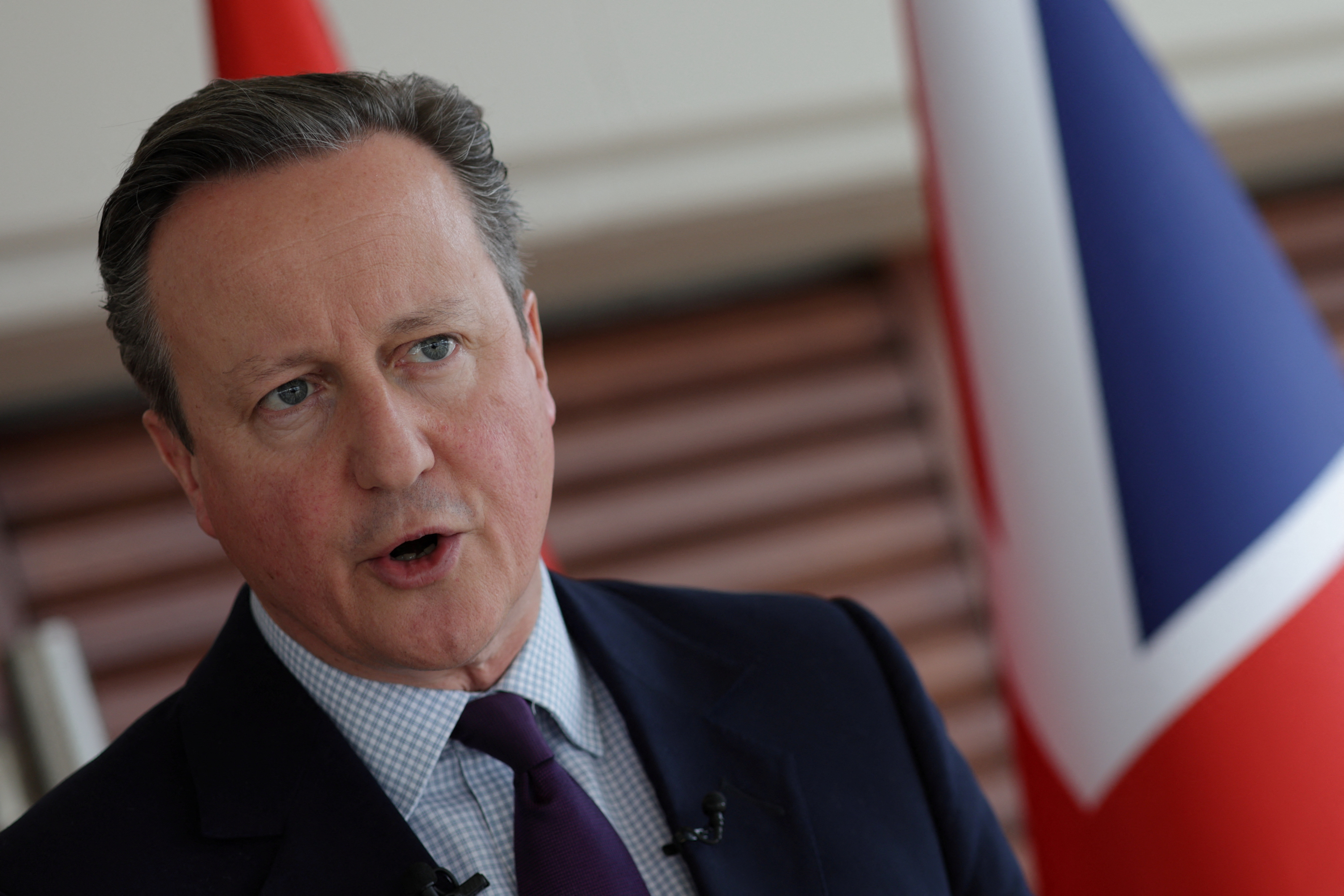 British Foreign Secretary Cameron speaks during an interview in Istanbul