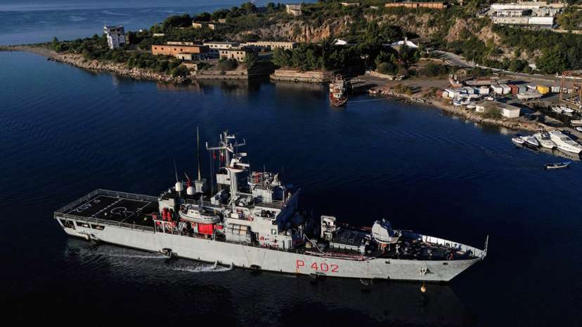 FILE PHOTO: A drone view of the Italian navy ship Libra carrying migrants arriving in Shengjin