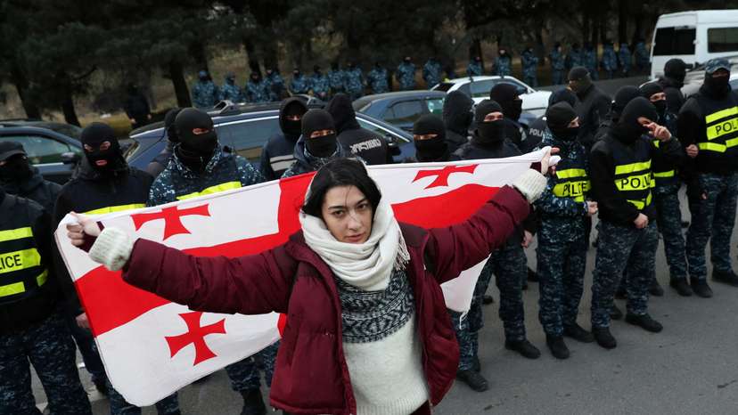 FILE PHOTO: Georgian opposition supporters hold a rally in Tbilisi
