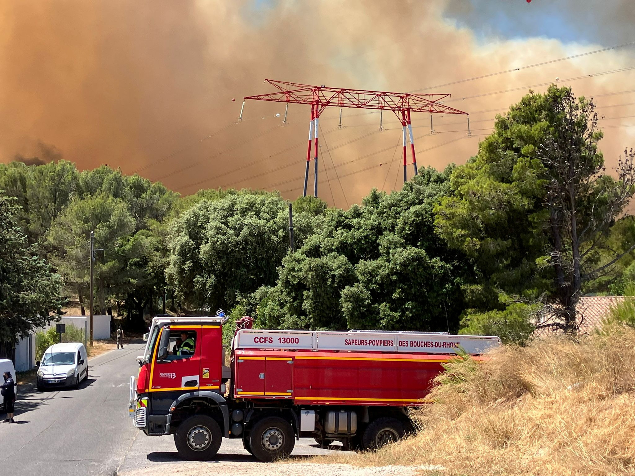 FILE PHOTO: High winds fan wildfire in southern France near Marseille