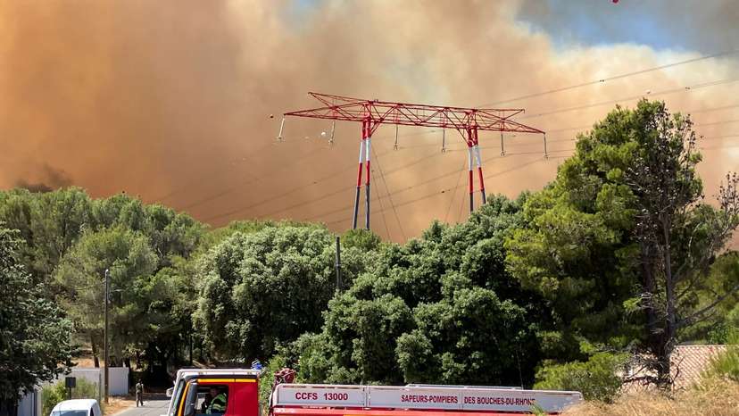 FILE PHOTO: High winds fan wildfire in southern France near Marseille