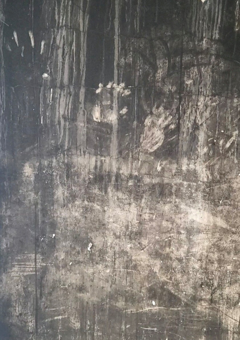 FILE PHOTO: Handprints on a blackened wall at Grenfell Tower, in London