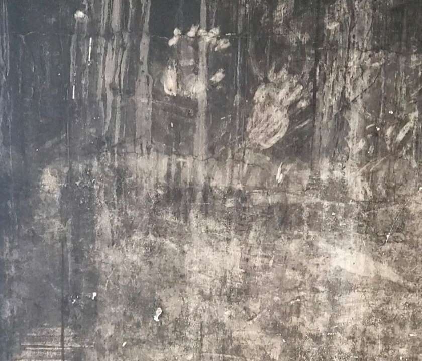 FILE PHOTO: Handprints on a blackened wall at Grenfell Tower, in London