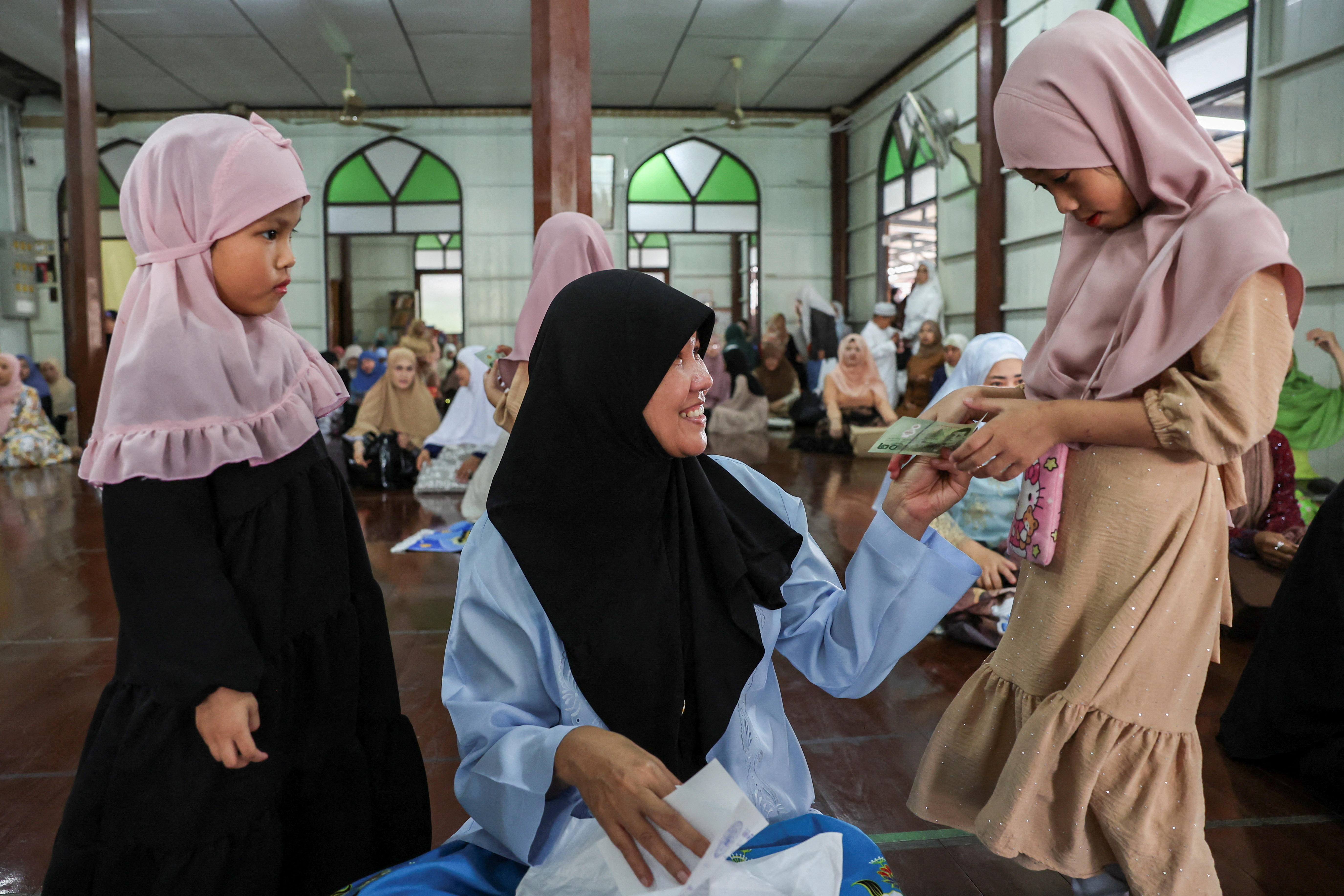 Muslims celebrate Eid with prayers in Bangkok
